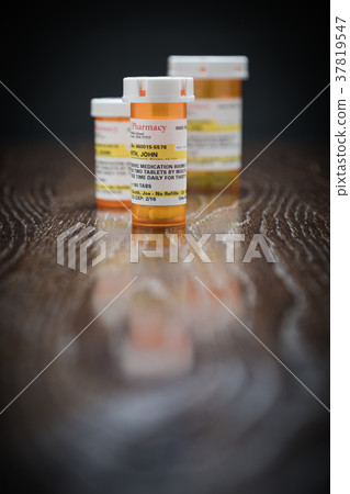 Variety of Non-proprietary Prescription Bottles 37819547