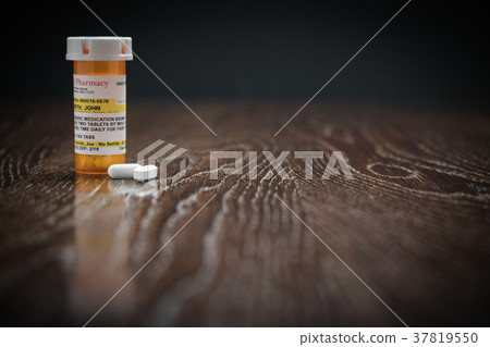 Variety of Non-proprietary Prescription Bottles 37819550