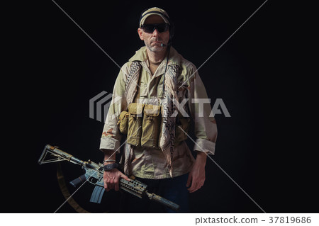 soldier of American special forces in Afghanistan holds a rifle soldier of American special forces in Afghanistan holds a rifle 37819686
