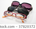 Three sunglasses, optical glasses white background 37820372