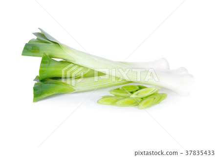 whole and sliced fresh leek on white background whole and sliced fresh leek on white background 37835433