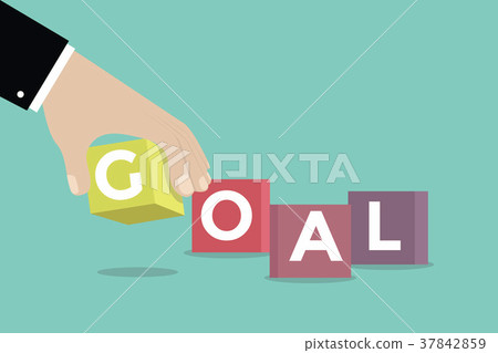 Businessman hand with GOAL cubic box puzzle. 37842859