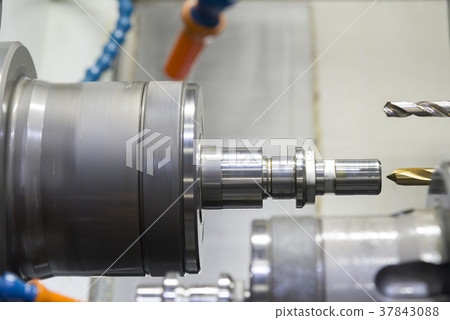 The CNC lathe machine The CNC lathe machine 37843088