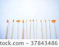 white background canvas and paint brushes 37843486