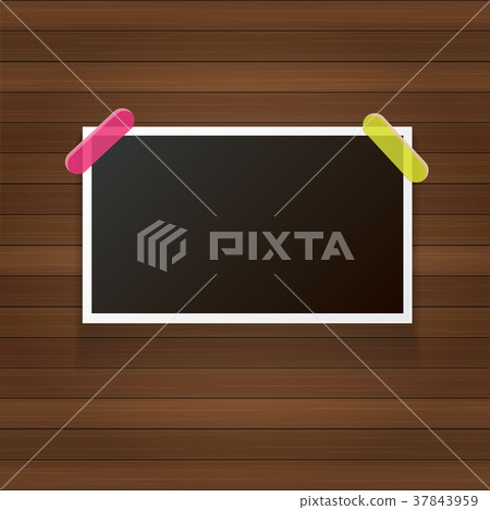 vintage photo frame with shadow isolated on wooden 37843959