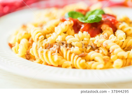 Traditional Italian pasta or fussili bolognese Traditional Italian pasta or fussili bolognese 37844295