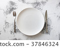 White Plate on white wooden background  37846324