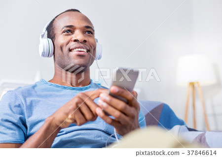 Nice happy man enjoying the music 37846614