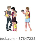 Happy young couple in photo studio. 37847228
