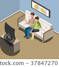 Young family watching tv in living room 37847270