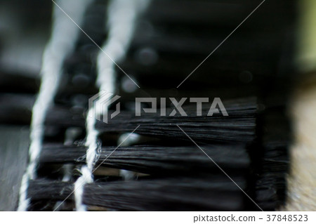 Black carbon fiber composite close up macro view Black carbon fiber composite close up macro view 37848523