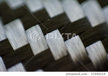 Black carbon fiber composite close up macro view Black carbon fiber composite close up macro view 37848524