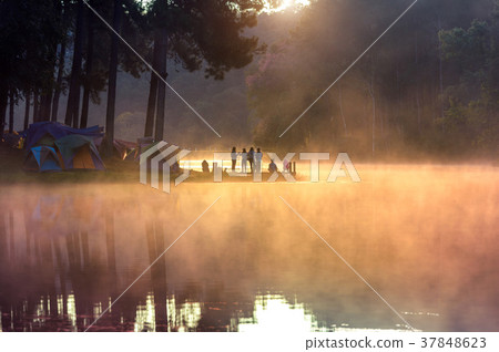 Silhouette of tourist enjoying at Pang Ung Silhouette of tourist enjoying at Pang Ung 37848623
