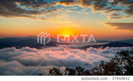 Beautiful sunrise at mountains  37848632