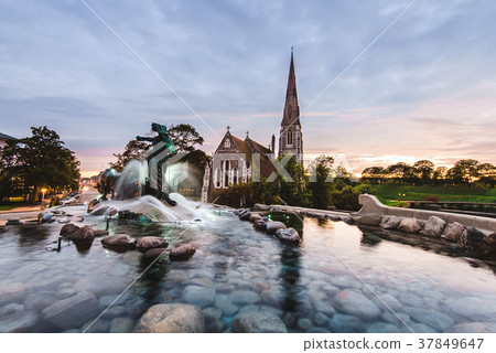 Gefion Fountain and St. Alban's Church in Copenhagen, Denmark. Gefion Fountain and St. Alban's Church in Copenhagen, Denmark. 37849647