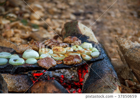 meatballs baked in the embers 37850659