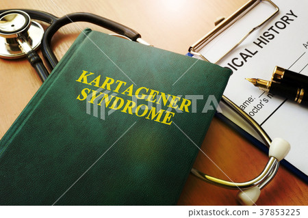 Book with title Kartagener syndrome on a table. Book with title Kartagener syndrome on a table. 37853225