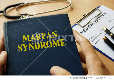 Book with title Marfan Syndrome on a table. 37853229