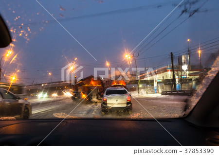 car traffic and street sweeping machines 37853390