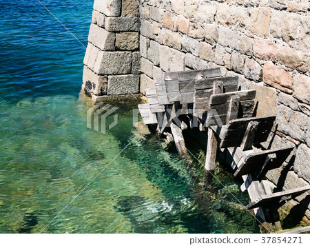 wooden wheel of old tide mill Birlot in Brehat 37854271