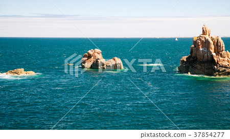 granite rocks in ocean on shore of Ile-de-Brehat granite rocks in ocean on shore of Ile-de-Brehat 37854277