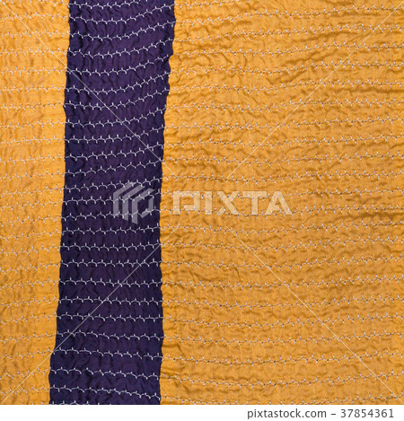 yellow textile background from stitched strips 37854361