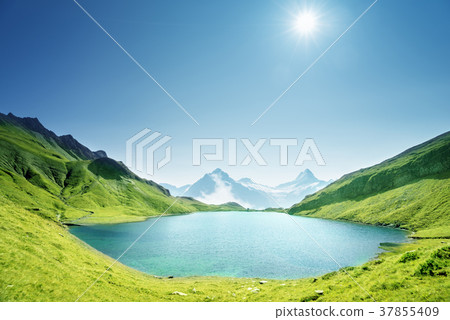 Schreckhorn and Wetterhorn from Bachalpsee lake 37855409