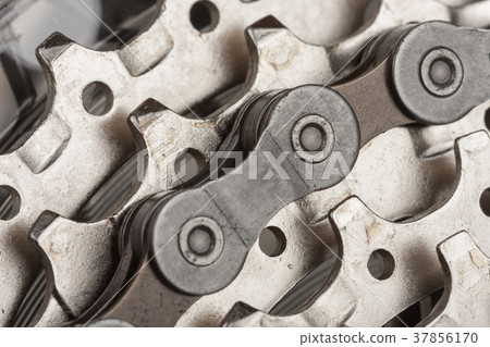 Close up chain on 9-speed cassette on rear wheel Close up chain on 9-speed cassette on rear wheel 37856170