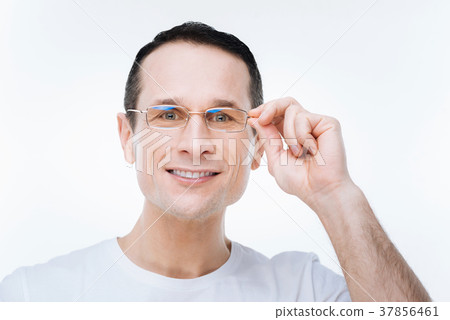 Portrait of a positive smart man smiling 37856461