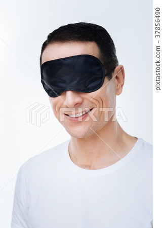 Positive delighted man being ready to sleep Positive delighted man being ready to sleep 37856490