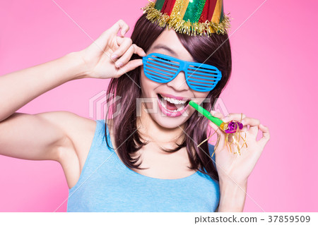 woman take noisemaker woman take noisemaker 37859509