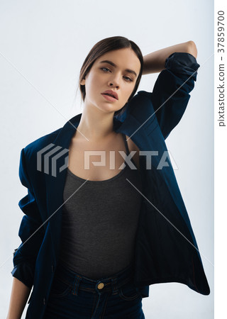 Musing irresistible woman making choice  37859700