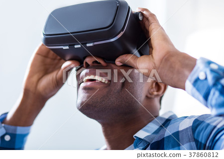 Portrait of a cheerful nice man in 3d glasses Portrait of a cheerful nice man in 3d glasses 37860812