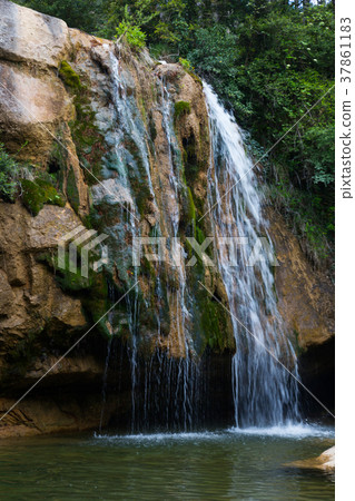 Waterfall in Catalonia surrounded by beautiful forests Waterfall in Catalonia surrounded by beautiful forests 37861183