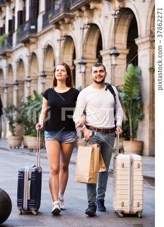 Couple going the historic city center Couple going the historic city center 37862271