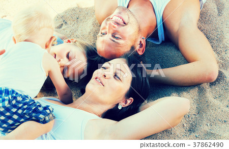 View from above on glad parents with children 37862490