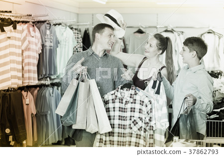 Family of shoppers bought a new wardrobe Family of shoppers bought a new wardrobe 37862793