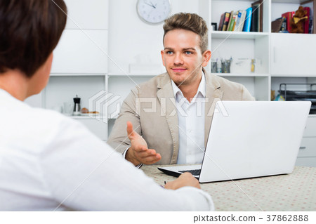 Journalist with laptop interviews the elderly wealthy woman Journalist with laptop interviews the elderly wealthy woman 37862888