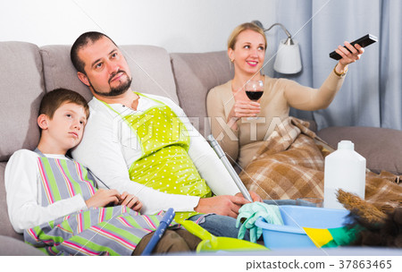 Tired father with son dressed for cleaning 37863465