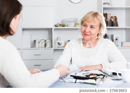 Mature woman and acccountant Mature woman and acccountant 37863663