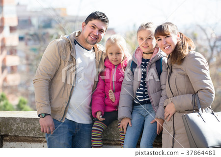 Portrait of family with kids at sunny day. Portrait of family with kids at sunny day. 37864481