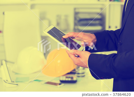 Man using touchscreen phone Man using touchscreen phone 37864620