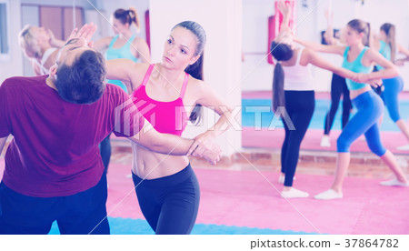 Adult women are doing self-defence-karate moves 37864782