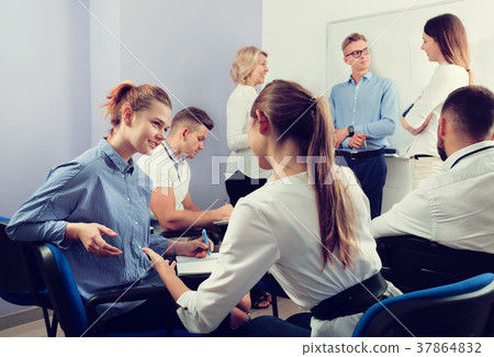 Students communicating during recess between lectures 37864832