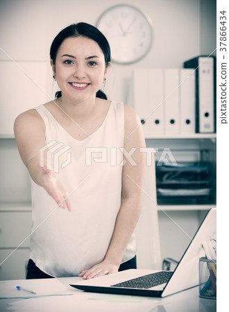 Female manager waiting for clients Female manager waiting for clients 37866434