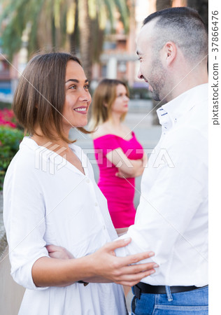 Lonely female is envying to smiling couple 37866476