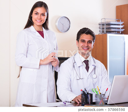 Two doctors in private clinic . Two doctors in private clinic . 37866598