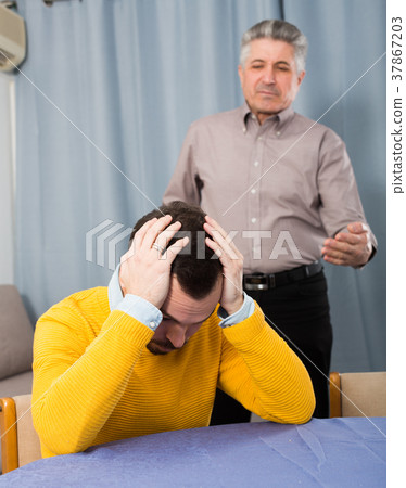 Adult father teaches his son Adult father teaches his son 37867203