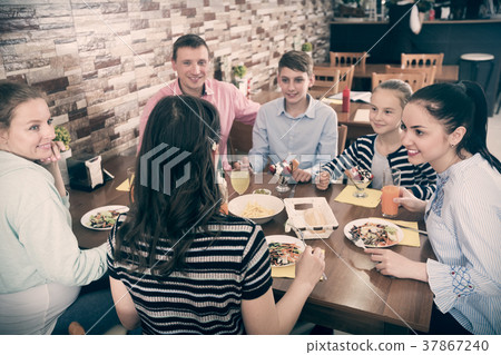Big family in cafe Big family in cafe 37867240