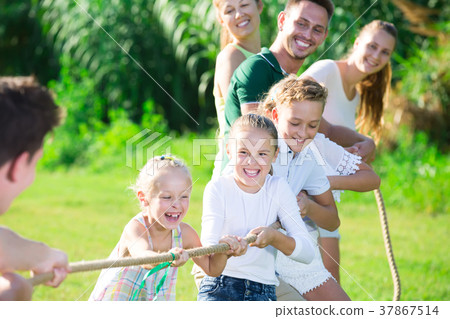 kids with parents playing active games kids with parents playing active games 37867514
